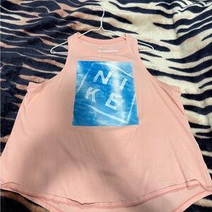 Nike Women's Light Pink Tank Top with Blue Logo